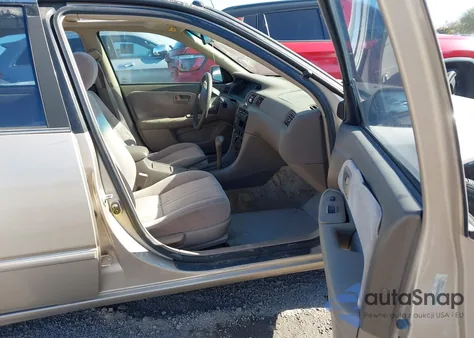 1998 Toyota Camry Le z USA, uszkodzony, nr VIN JT2BG28K0W0185903